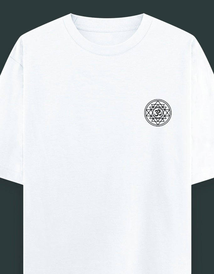 Off-white oversized spiritual t-shirt with embroidered Om Sri Yantra sacred geometry emblem on the left chest, worn by a male model.