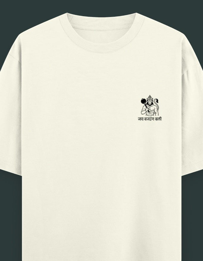 Male model wearing a white oversized t-shirt featuring a small Hanuman Ji emblem on the left chest.