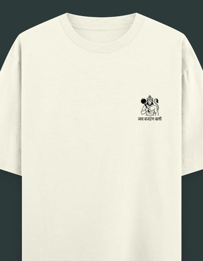 Male model wearing a white oversized t-shirt featuring a small Hanuman Ji emblem on the left chest.