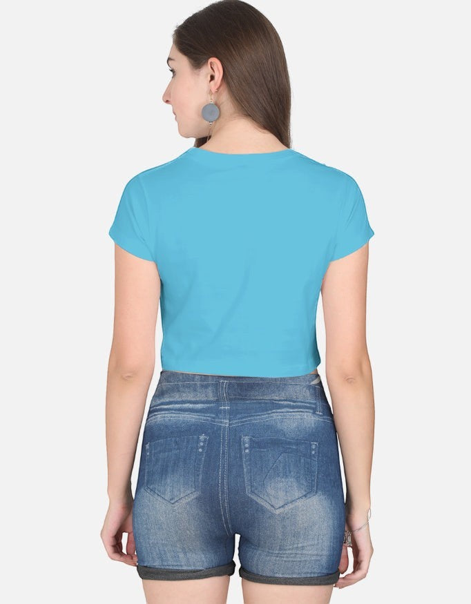 Print 999 light blue half-sleeve cotton crop top worn by a model, back view showing a casual, breathable fit.