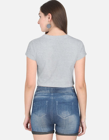 Print 999 grey half-sleeve cotton crop top worn by a woman, back view showing a casual fitted silhouette.