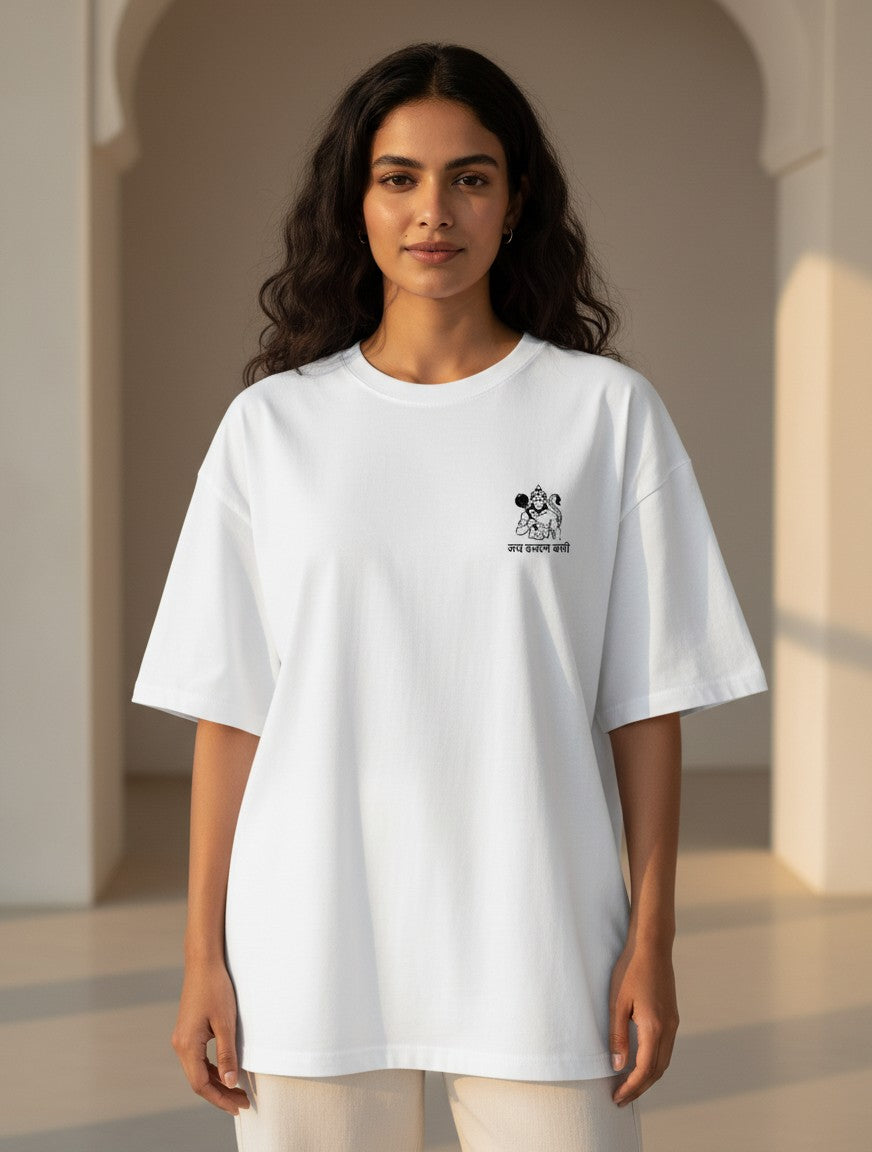 Woman wearing a Print 999 white oversized cotton t-shirt with a small black Hanuman Ji graphic on the chest