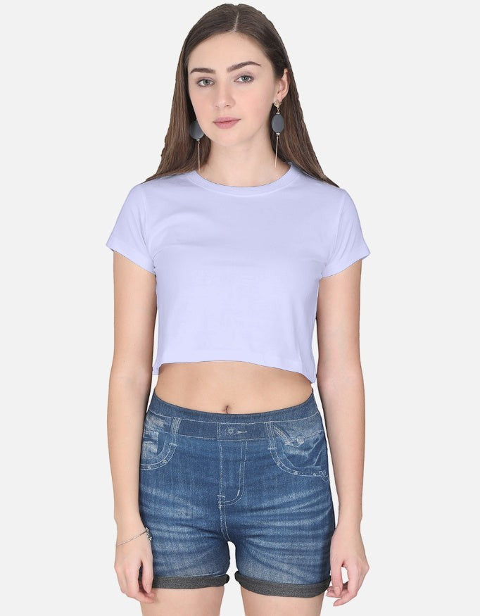 Print 999 light purple half-sleeve cotton crop top worn by a woman with blue denim shorts