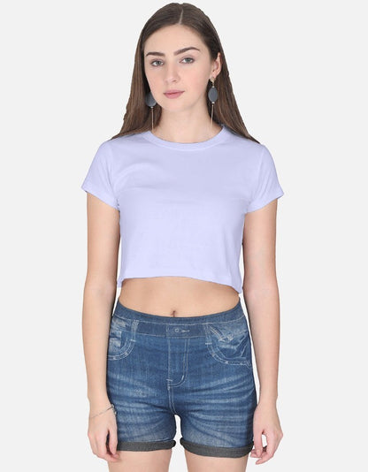 Print 999 light purple half-sleeve cotton crop top worn by a woman with blue denim shorts