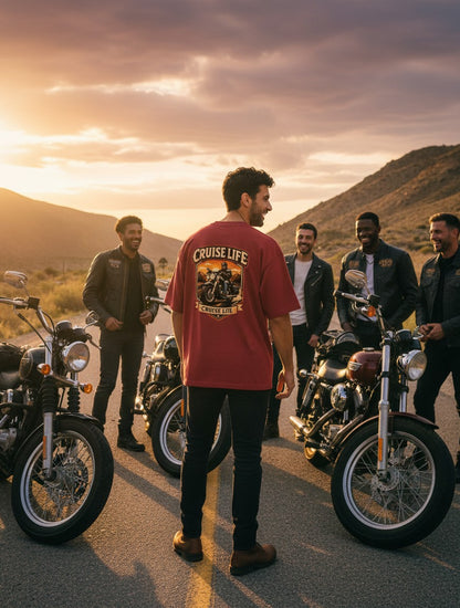 Print 999 oversized maroon cotton t-shirt with a vintage motorcycle graphic, worn by a man among friends on a road trip.