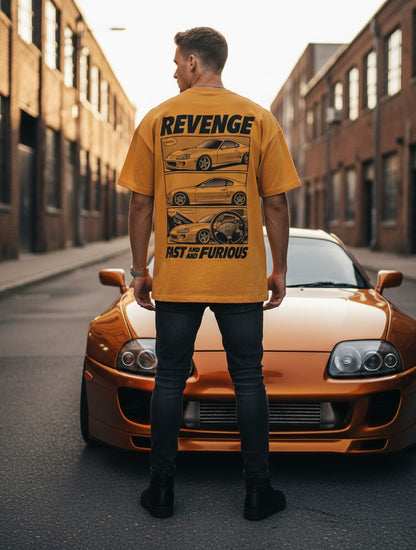 Print 999 mustard yellow oversized cotton t-shirt with a black car graphic print on the back, worn by a man outdoors.