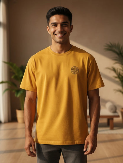 Print 999 mustard yellow oversized t-shirt with a small embroidered black Om Sri Yantra emblem on the chest.