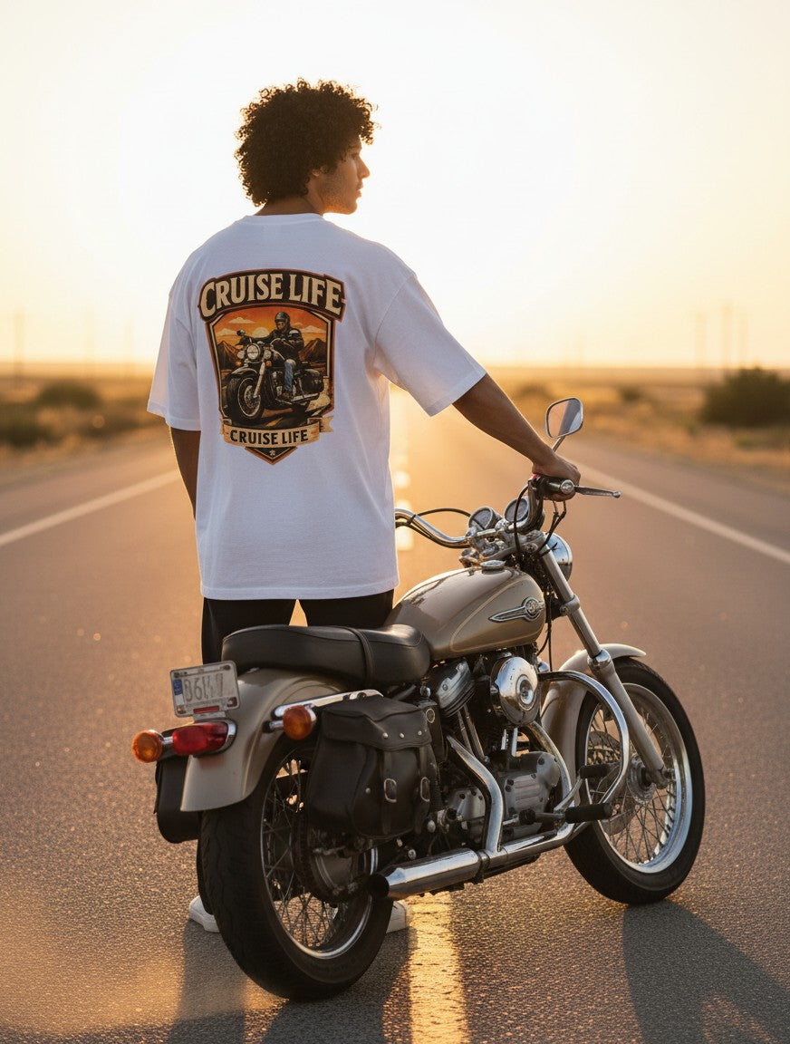 Print 999 white oversized cotton t-shirt with a motorcycle graphic on the back, worn by a man standing with his bike.