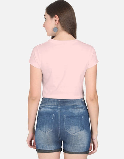 Print 999 light pink cotton half-sleeve crop top worn by a woman, back view showing a casual fitted silhouette.