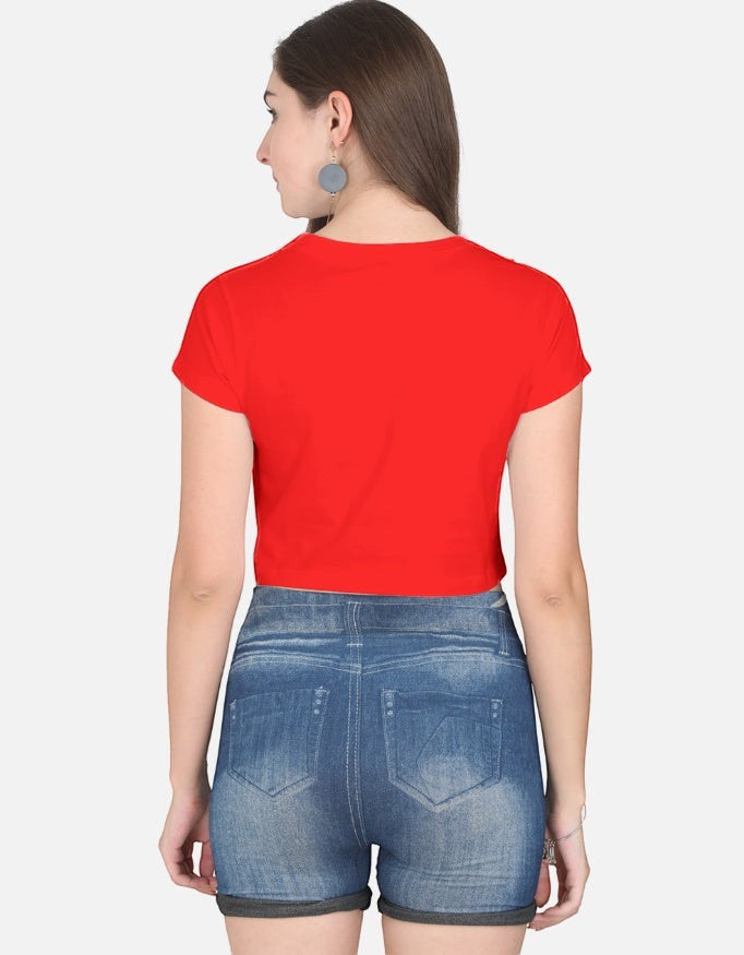 Print 999 red half-sleeve cotton crop top worn by a woman, back view showing a casual fit with blue denim shorts.