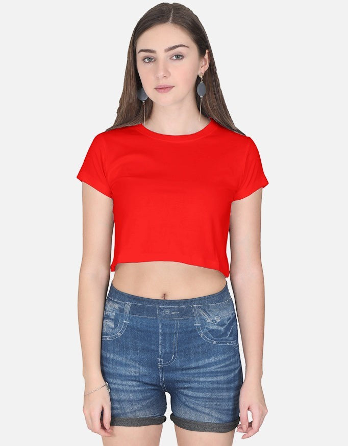 A model wearing a Print 999 red half-sleeve cotton crop top paired with denim shorts for a casual look.