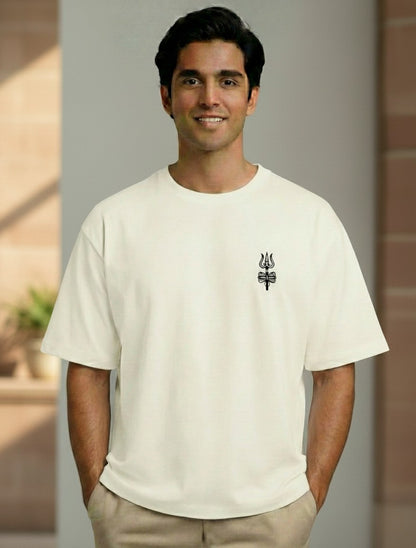 A man wearing a Print 999 off-white heavyweight cotton oversized t-shirt with a minimal black Shiva Trishul print.