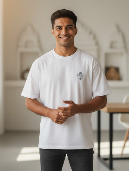 Print 999 white oversized heavyweight cotton t-shirt with a small Ganesh line art print on a smiling man.